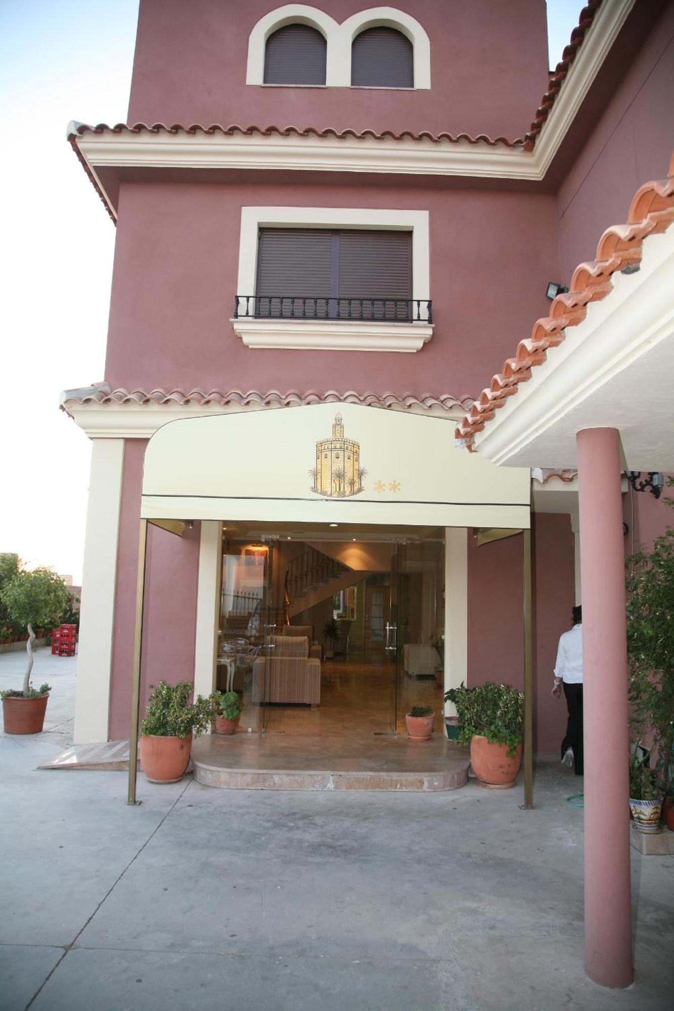 Hotel Torre Del Oro La Rinconada Bagian luar foto
